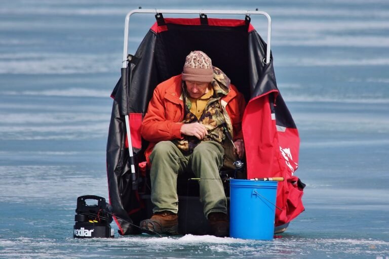 Ice fishing on a frozen lake
