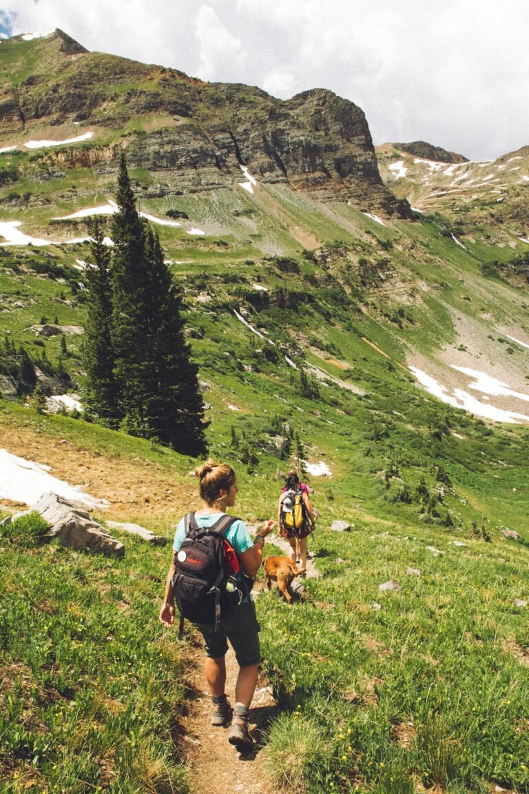 Hiker overlooking a mountain lake