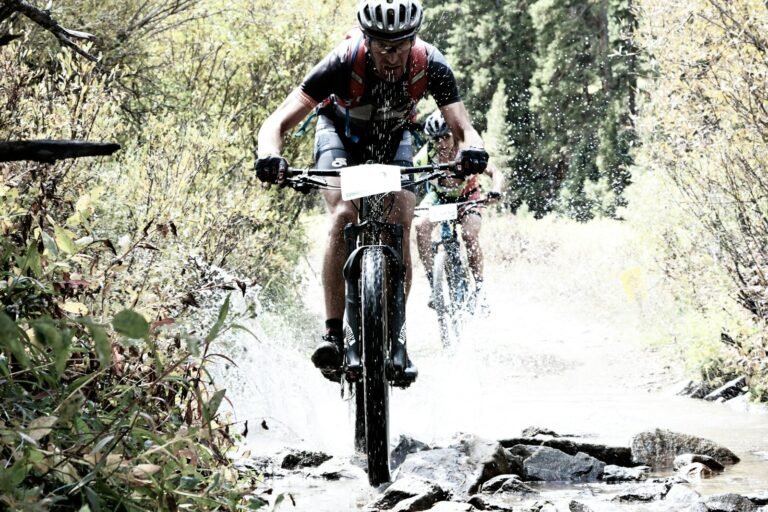 A mountain biker riding through the woods
