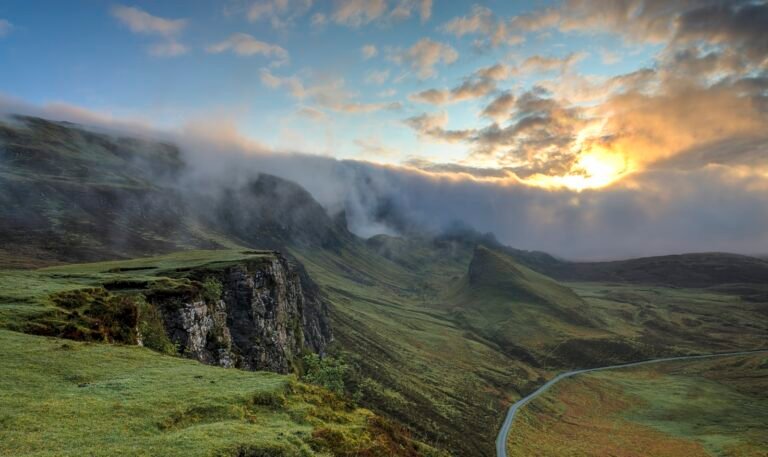 Foggy layered ridges at sunrise