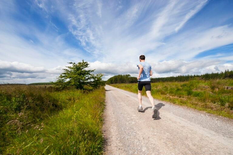 A trail runner on a mountain path